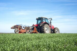 Agricultural Equipment with Cultivator Gauge Wheel and Planter Tires