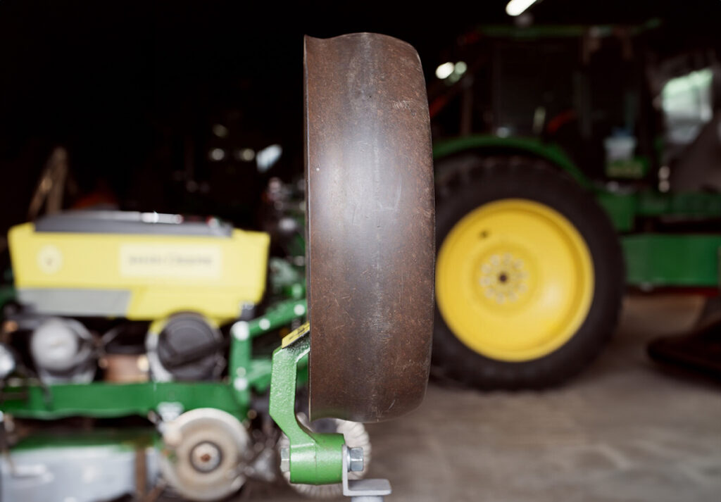 Close-up of planter gauge wheel farming tools made in the US and available from a 4AG farm equipment dealer.