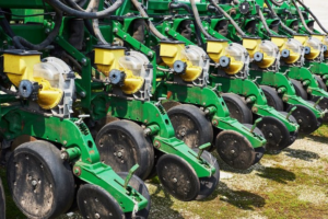 Close-up of no till planter gauge wheels on a row planter, featuring durable cultivator gauge wheels and planter gauge wheels designed for accurate seed depth and improved planting performance.