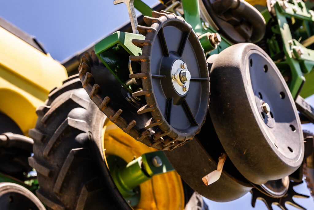 Planter closing wheels on a no till planter designed to close the seed trench and improve seed-to-soil contact during no till farming.