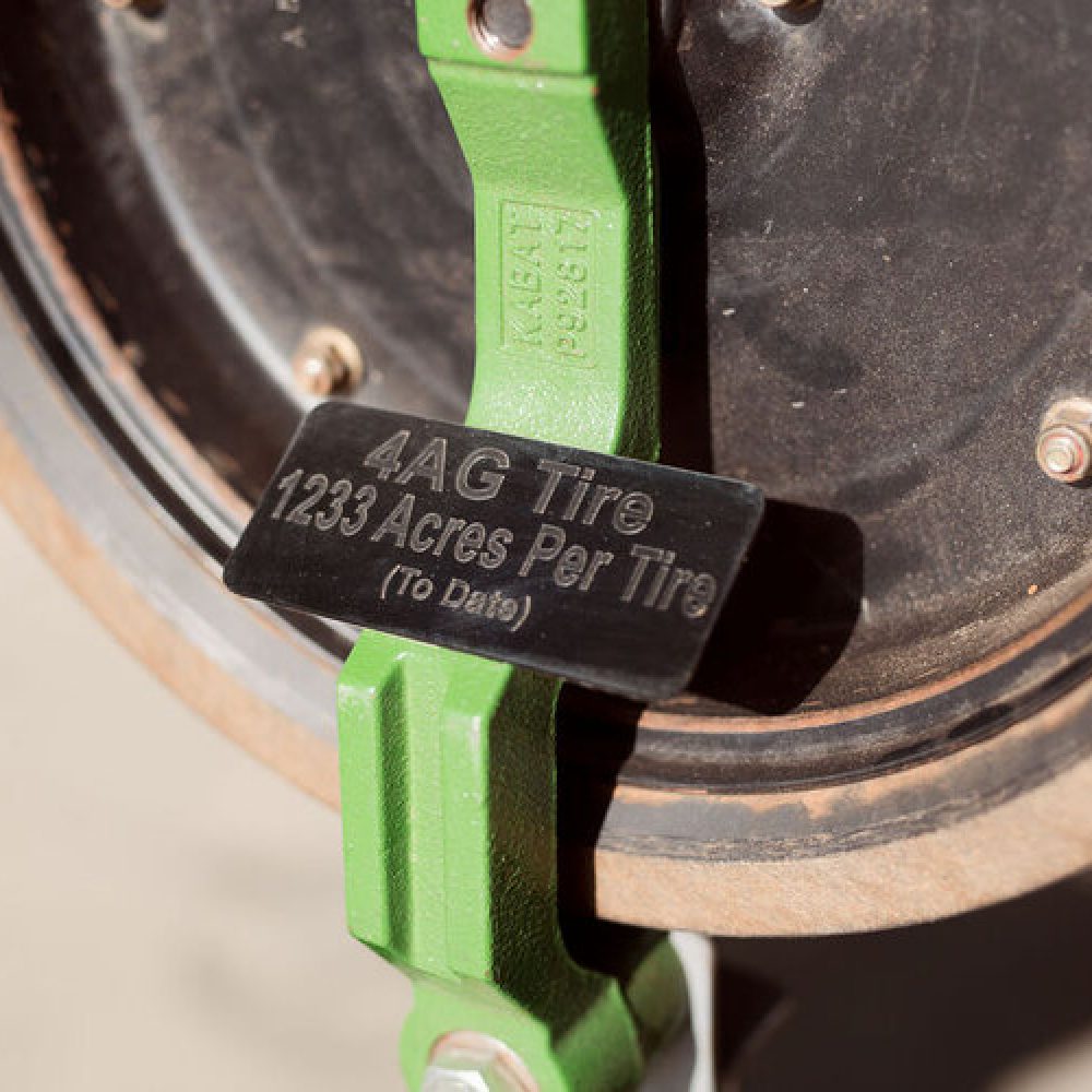 Close-up of the 4AG gauge wheel showcasing its durable design and high-quality composition, built for long-lasting performance in farming operations.